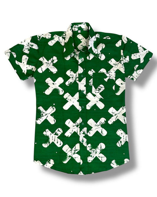 Green shirt with white cross pattern on a white background